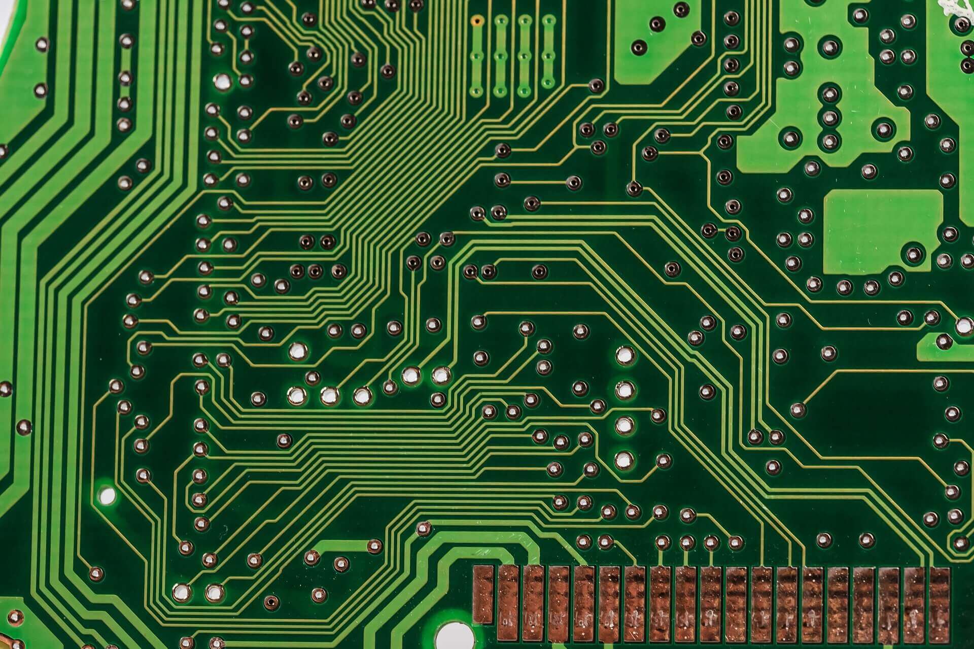 Automated SMT line assembling the circuit boards described in this guide
