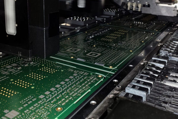 Inspection and test station checking assembled boards on the production line