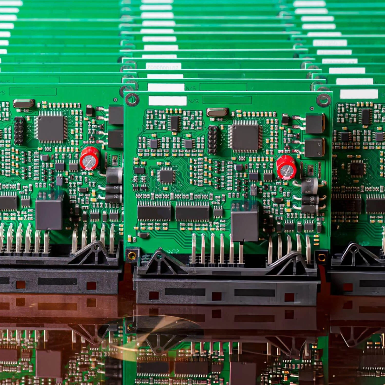 Automated SMT line assembling the circuit boards described in this guide