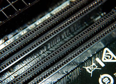 A close-up view of an electronic printed circuit board with assembled radio components