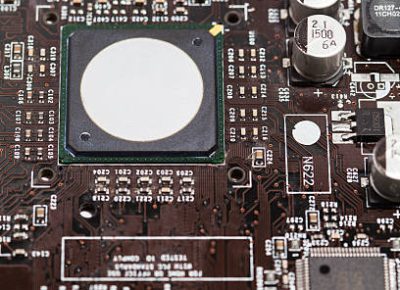 Close up of a pc motherboard with microprocessor and other chips